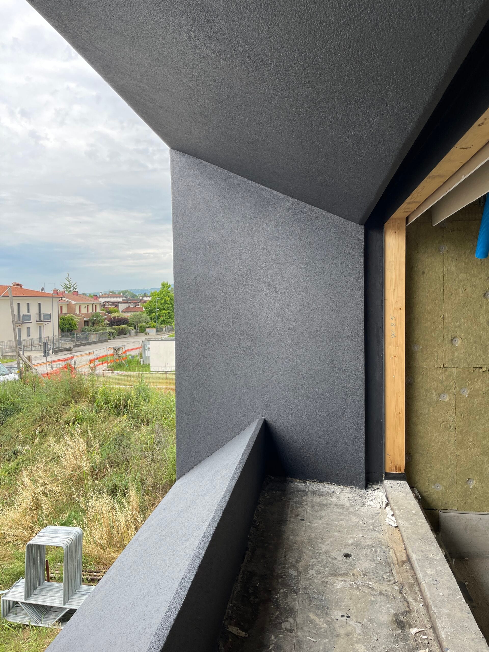 a building under construction with a view of a city